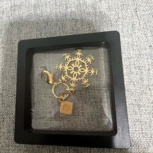 Chanel Gold Snowflake Bag Charm Keychain Limited Edition Holiday CC Charm